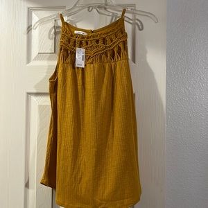 Maurices tank top XS new with tag. color is like a mustard yellow.